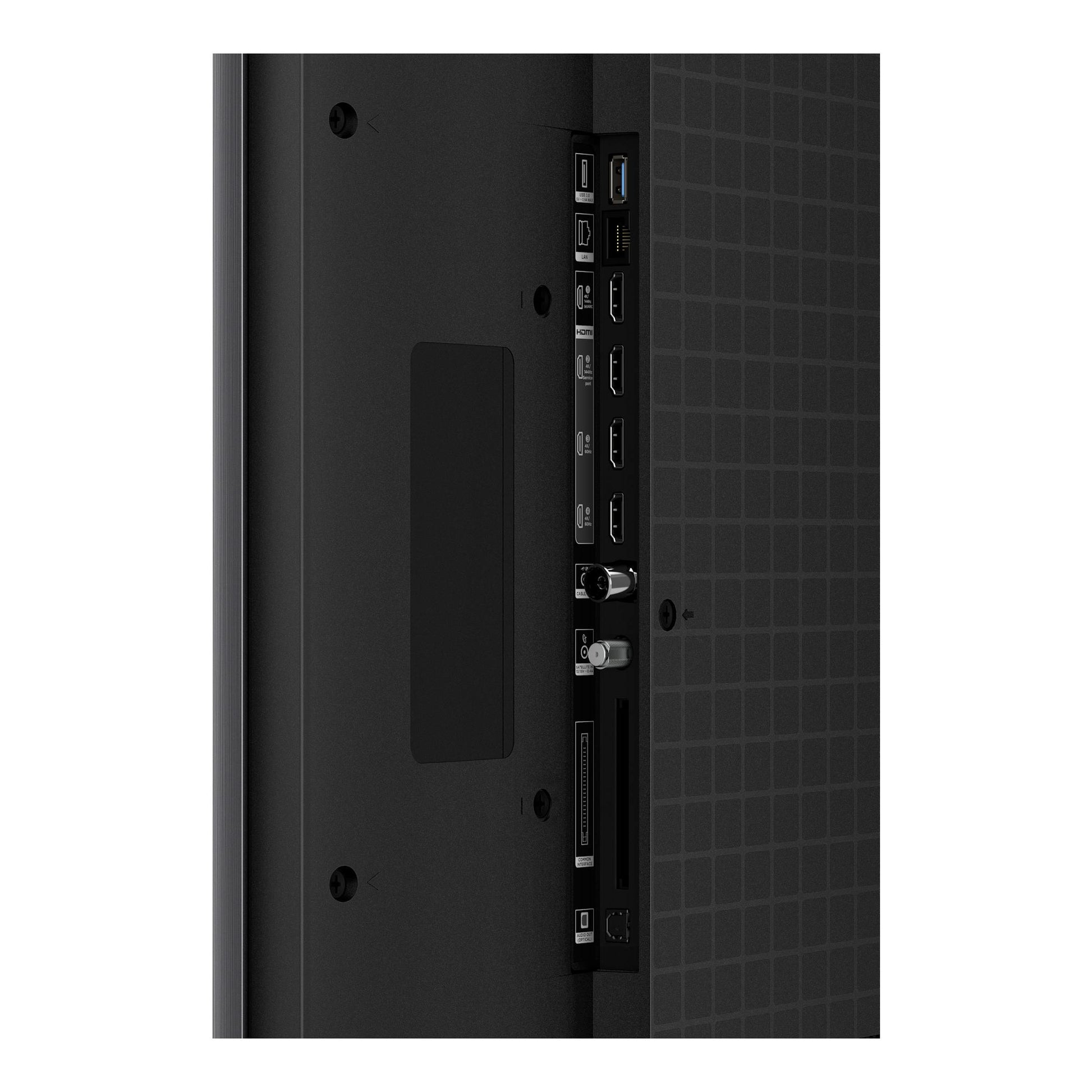 Parte trasera de un televisor TCL 85C7L negro, con puertos HDMI, USB, LAN y antena visibles.