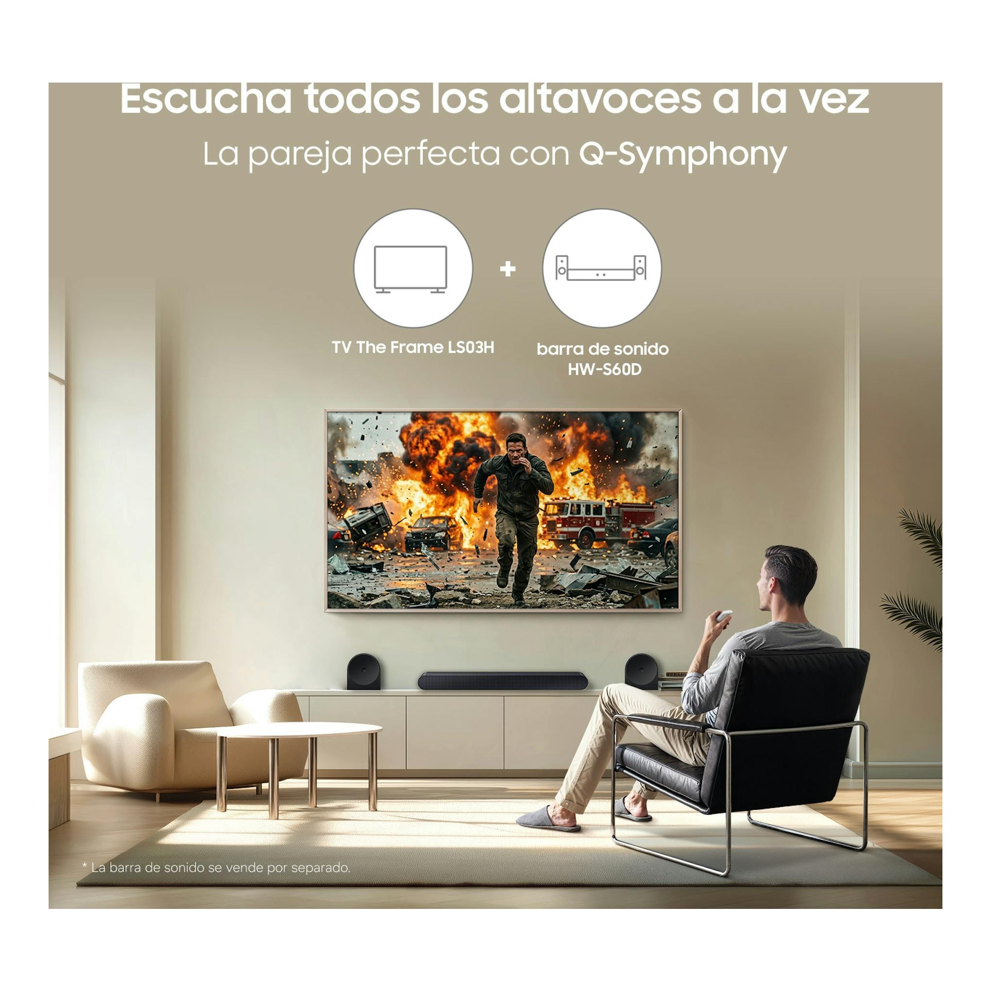 Salón con Samsung The Frame LS03H montado en pared, barra de sonido y escena de explosión en pantalla.
