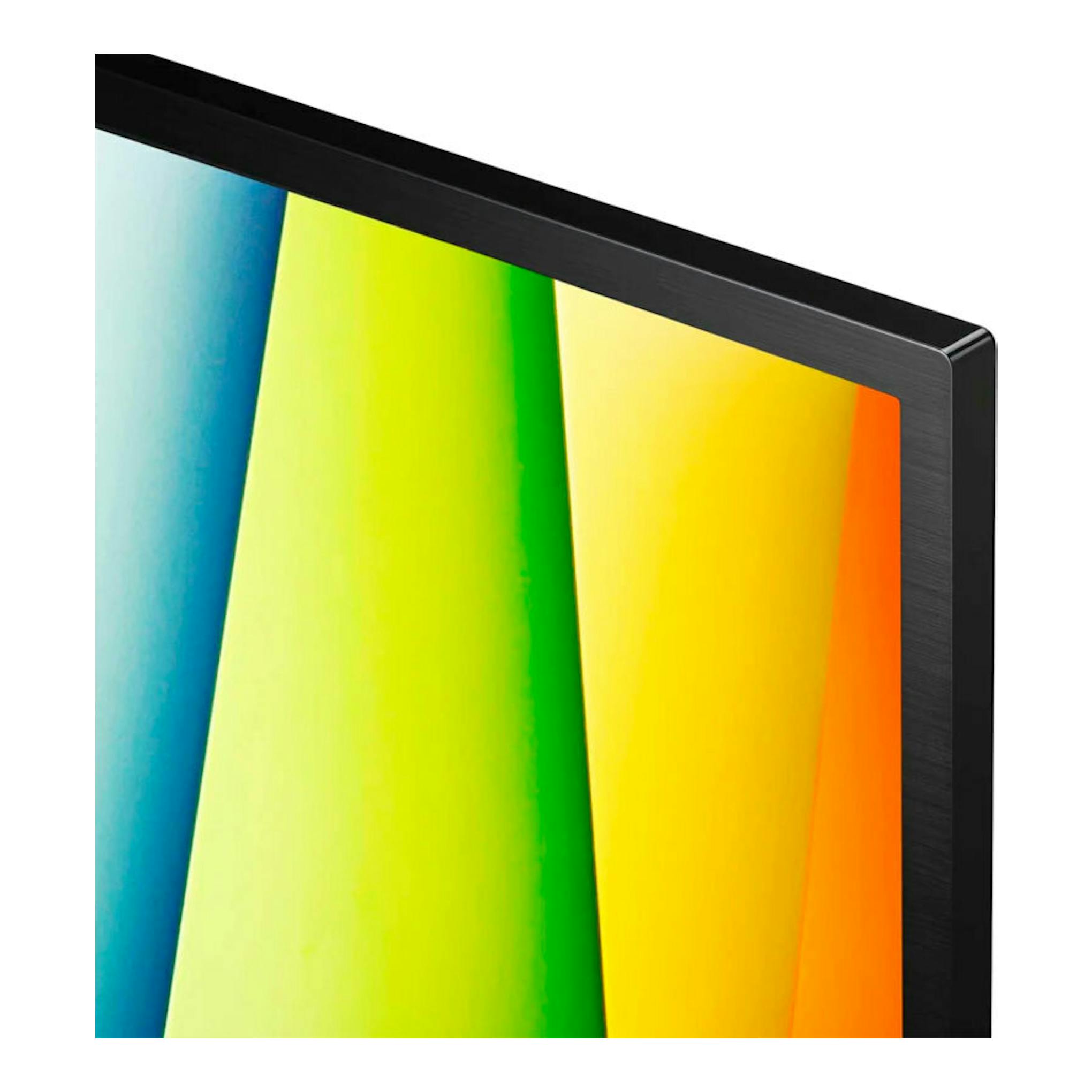 TV LG 32LQ630B6LA, vista frontal en ángulo, marco negro y pantalla con franjas de colores.