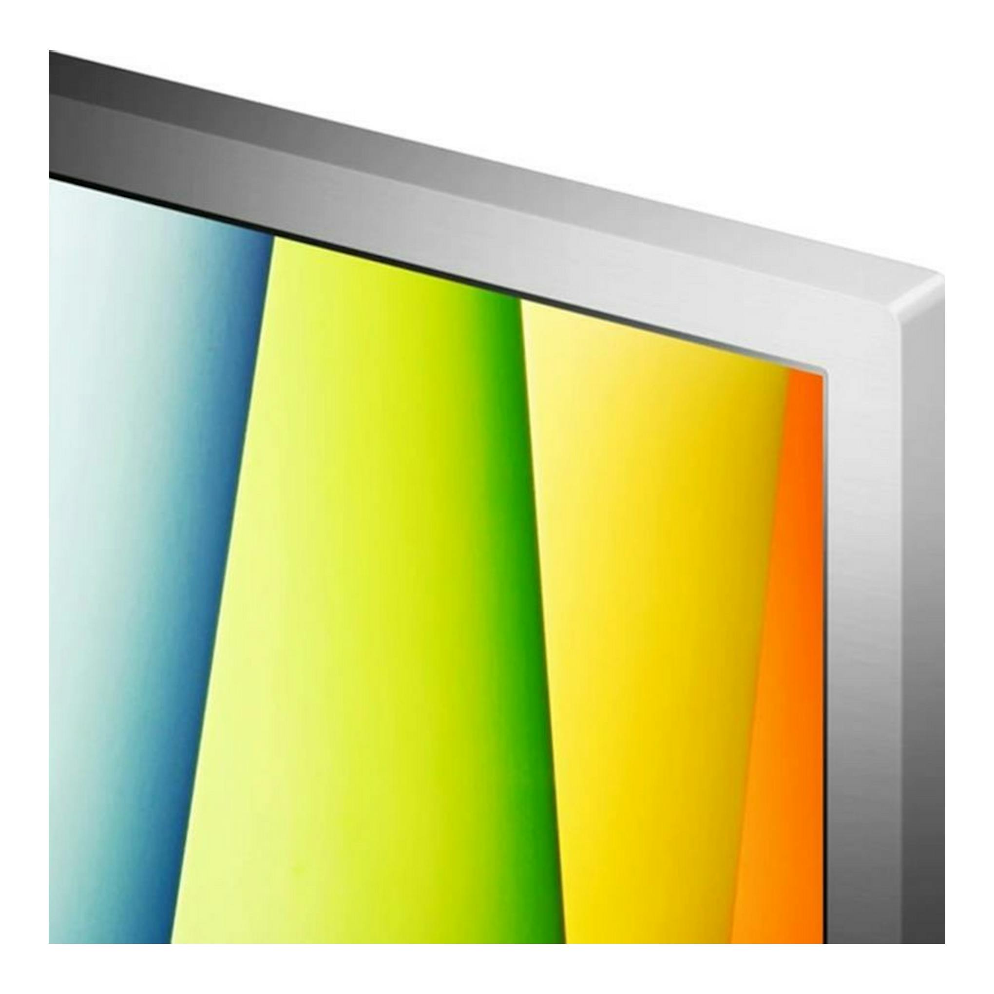 Televisor LG 32LQ63806LC LED de 32 pulgadas, vista parcial en ángulo, marco plateado y pantalla multicolor.