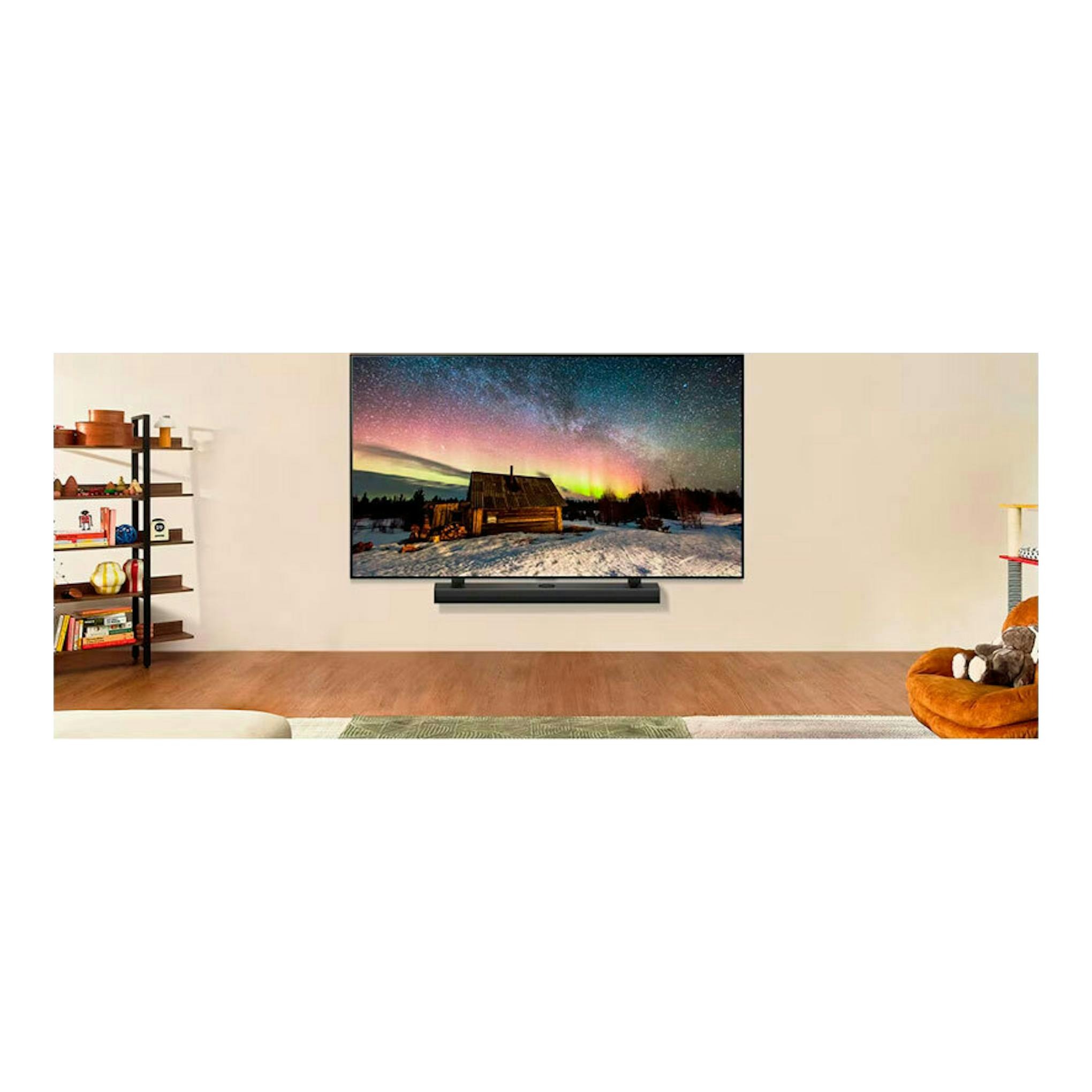 TV LG 50UT91006LA.AEU negra, vista frontal, montada en pared con barra de sonido debajo.