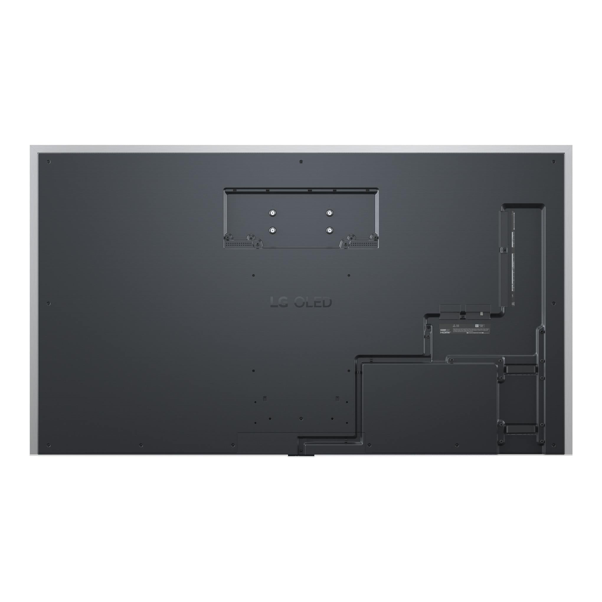 Parte trasera de un TV OLED LG OLED77G64LW, negro/gris, vista frontal con soporte VESA y conexiones laterales.