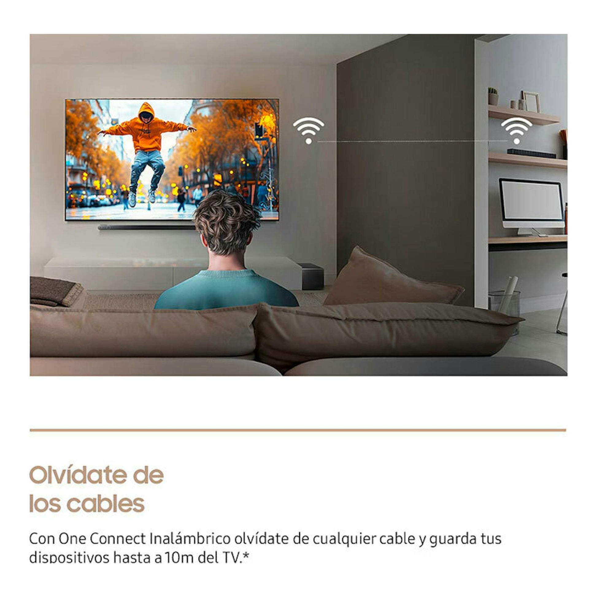 TV Samsung TQ75LS03FWUXXC montada en pared en un salón, vista frontal, con escena en pantalla y símbolo inalámbrico.