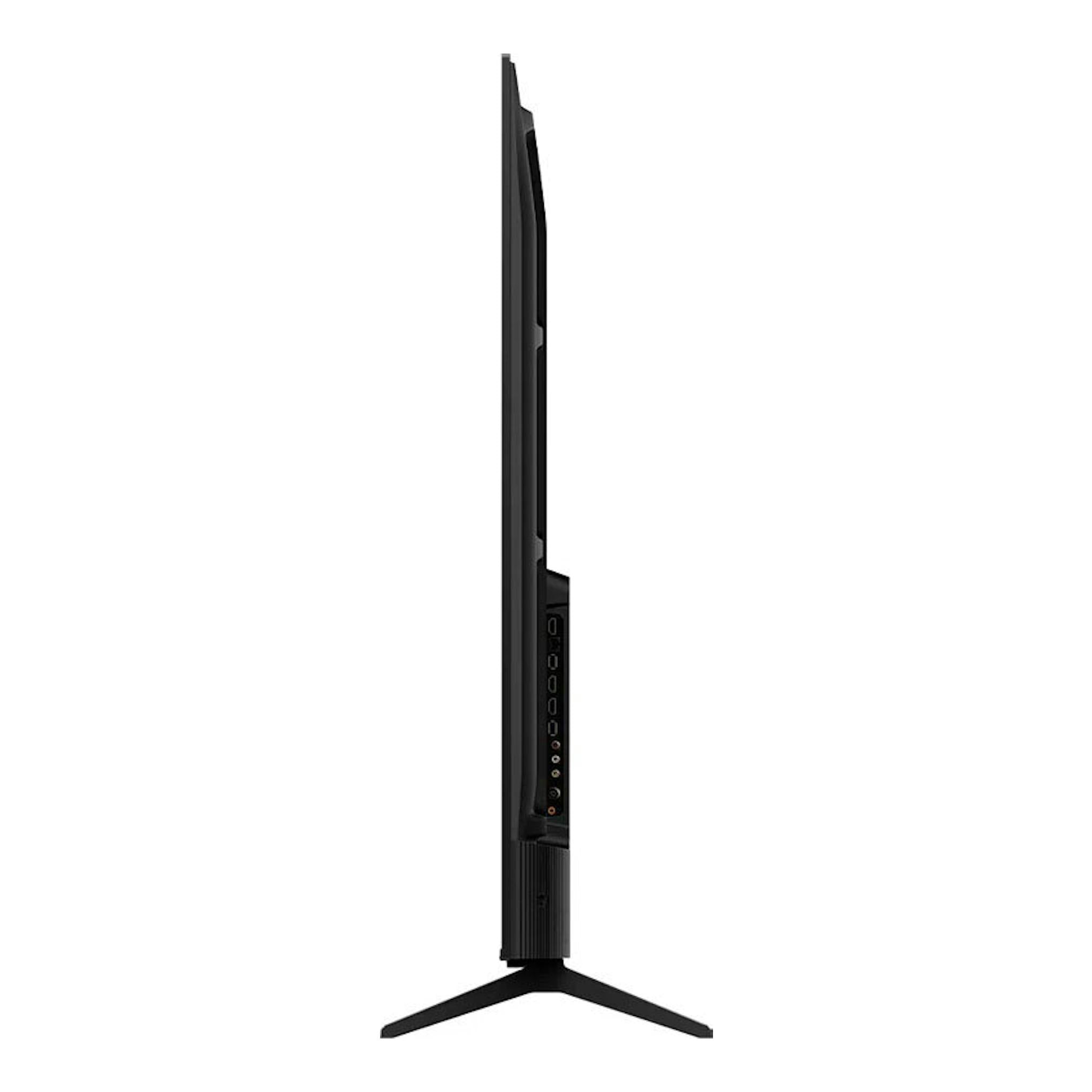 TV TCL 32S4K negra, vista lateral sobre base, con puertos visibles.