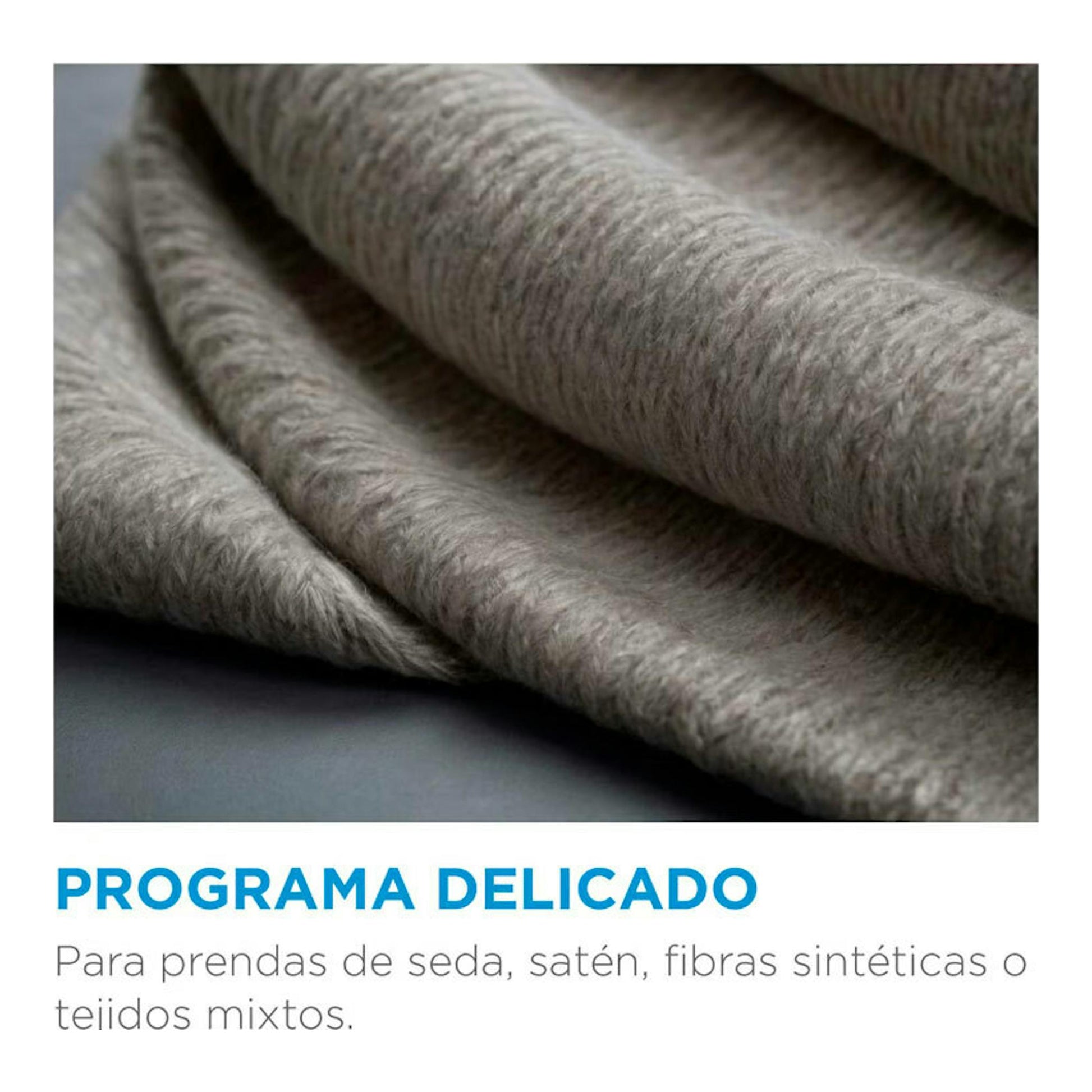 Midea MF100W60/1/W-ES: detalle de tejido gris y texto “Programa delicado” para seda y tejidos sintéticos.